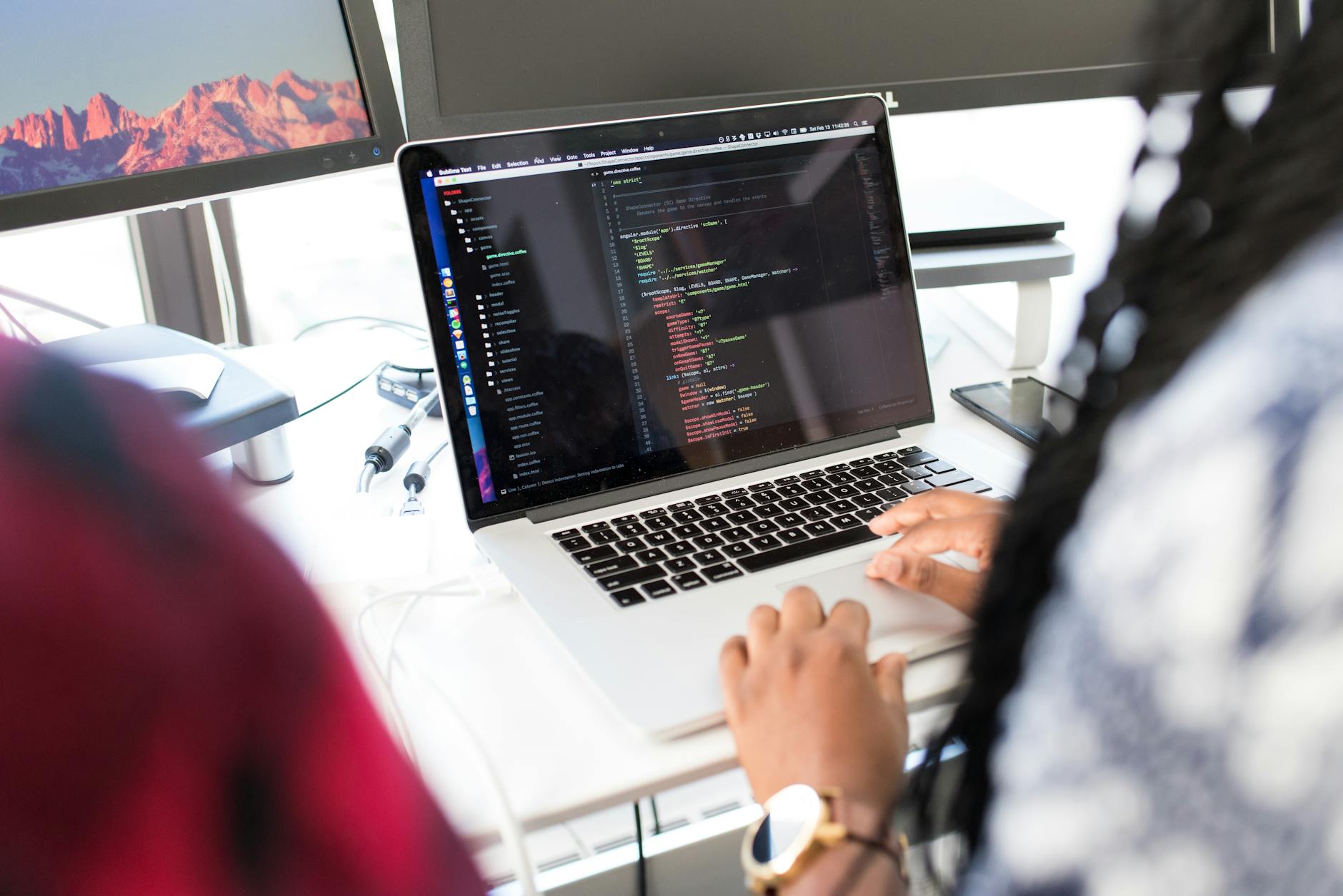 Team di developer al lavoro su progetto TypeScript